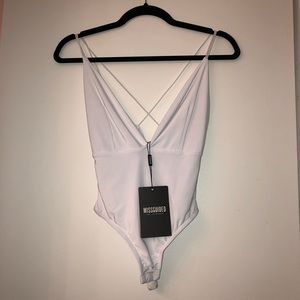 NEW WITH TAGS strappy open back bodysuit size XS-S